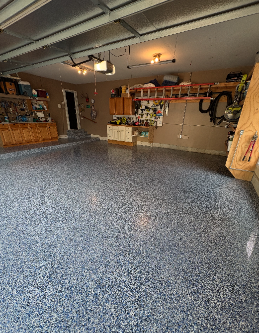 Blue and gray flake epoxy garage floor coating by HKH Custom Coatings