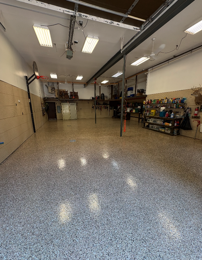 Tan speckle flake epoxy garage floor coating by HKH Custom Coatings