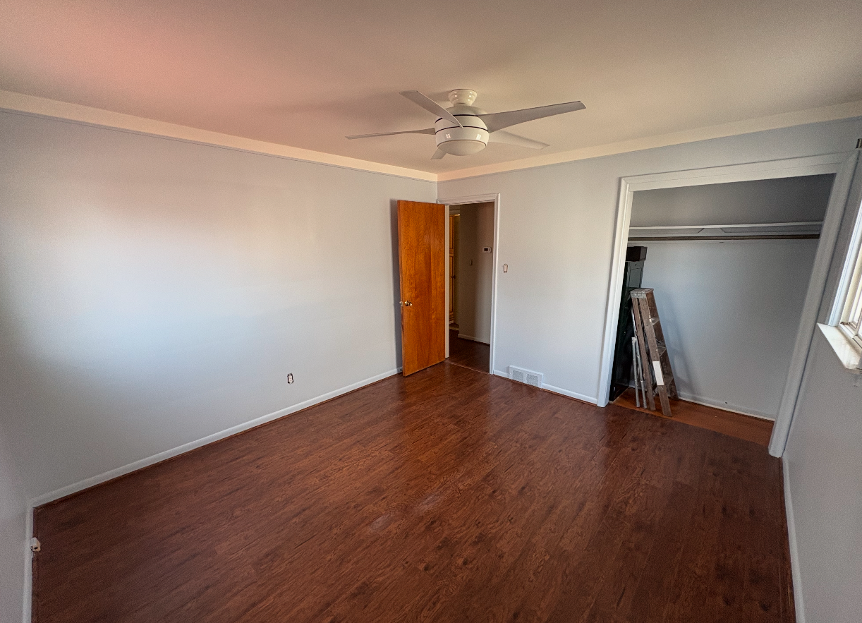 Freshly painted bedroom interior by HKH Custom Coatings