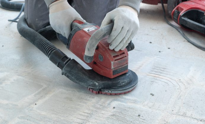 Concrete grinding surface prep for an epoxy floor coating
